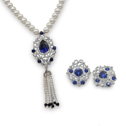 Rhodium plated diamond style set with zircon and blue stones